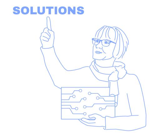Tarja Rapala-Virtanen pointing a banner text saying "solutions", while holding a banner depicting a circuit board.